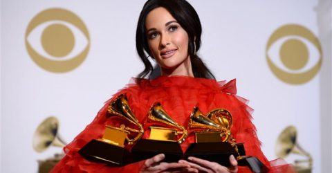 Women reign at glitzy Grammys gala that also makes rap history