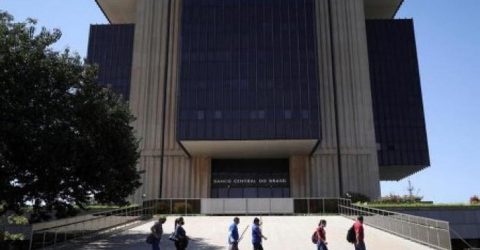 Brazil hikes interest rate, signals may tighten further