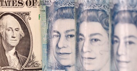 Pound falls more than 1% against dollar after BoE move